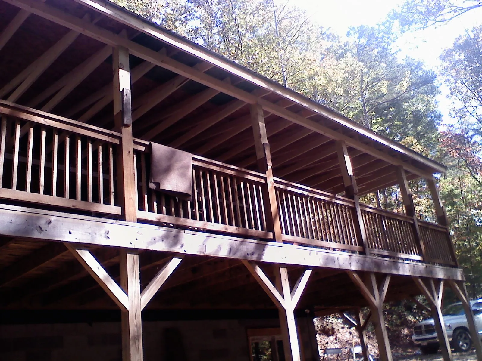Timber framing under a new elevated porch and deck — Roof Leak Repair in Highland Lakes by Roofing Brothers